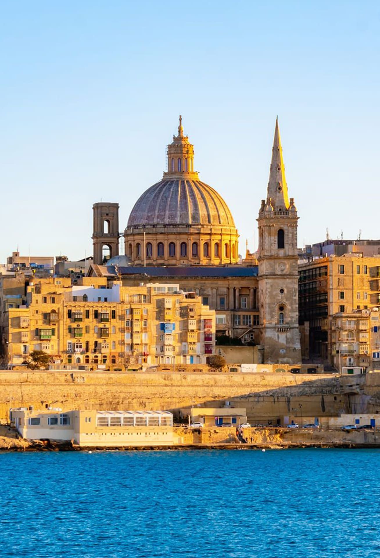 A breathtaking view of Valletta, Malta, with the Basilica of Our Lady of Mount Carmel and St. Paul’s Pro-Cathedral.
