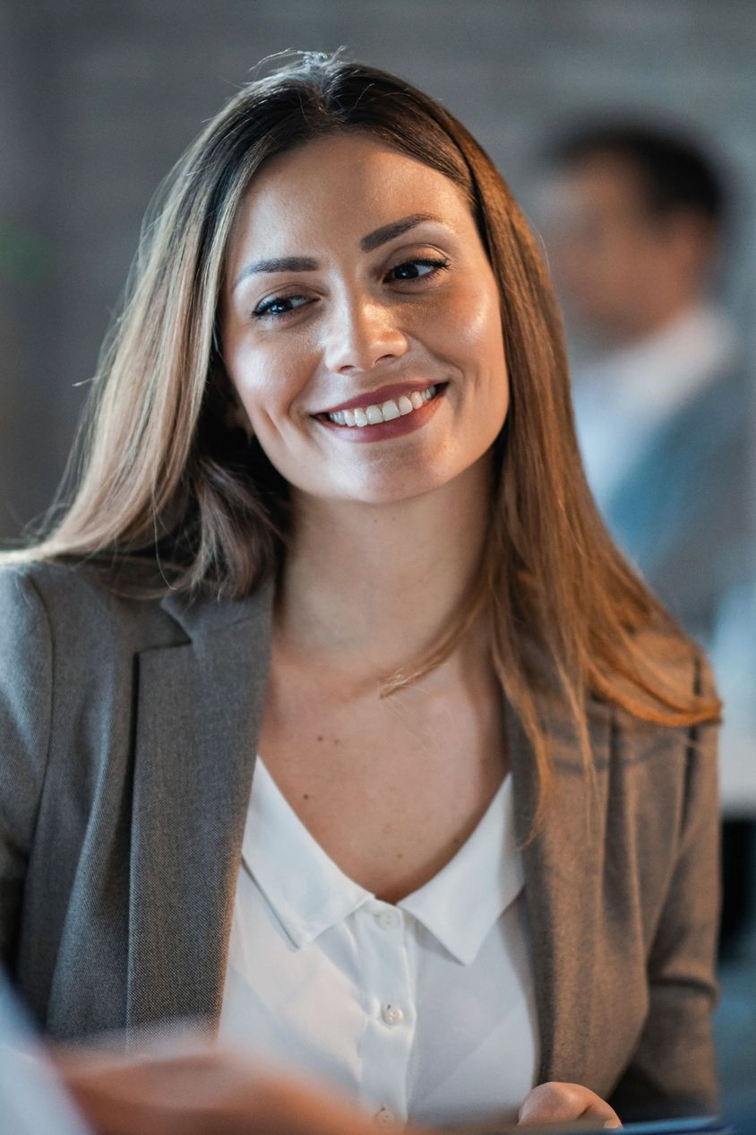 Confident Businesswoman in a Corporate Meeting - Professional Workplace Setting